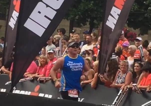 Ritchie Humphreys completing his first Ironman event