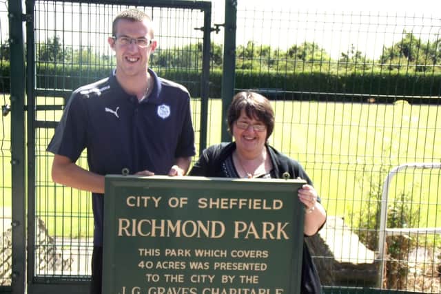 Barbara Morris with a coach from Sheffield Wednesday