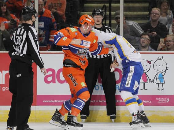 Davey Phillips fights on the boards with a Fife opponent Pic by Hayley Roberts