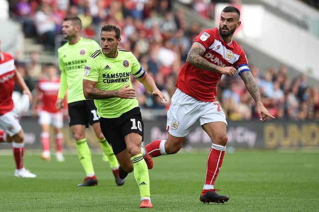 Sheffield United's Billy Sharp with Marlon Pack of Bristol City
