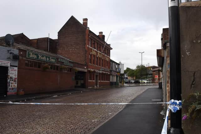 A police cordon remains in place. Picture: Andrew Roe