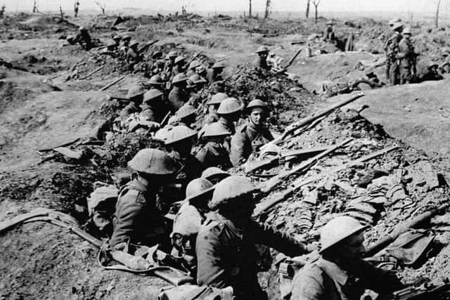 File photo dated 01/07/1916 of British infantrymen occupying a shallow trench in a ruined landscape before an advance during the Battle of the Somme. Picture: PA Wire