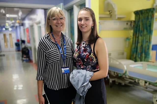 Helen Singleton with the Children's Hospital Charity's Angela Dunn on the cancer ward.