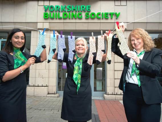 Yorkshire Building Society colleagues Kiran Amin, Jackie Jenkins and Michelle Wright launch Socktober campaign