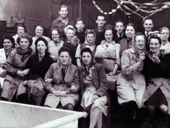 Burdall's bottling alley staff at Christmas in the 1940s