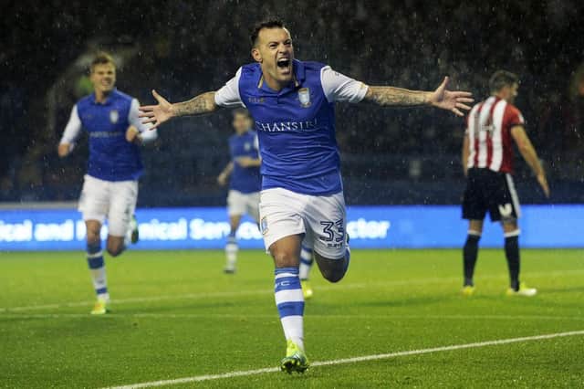 Ross Wallace celebrates scoring one of his 13 goals for Sheffield Wednesday