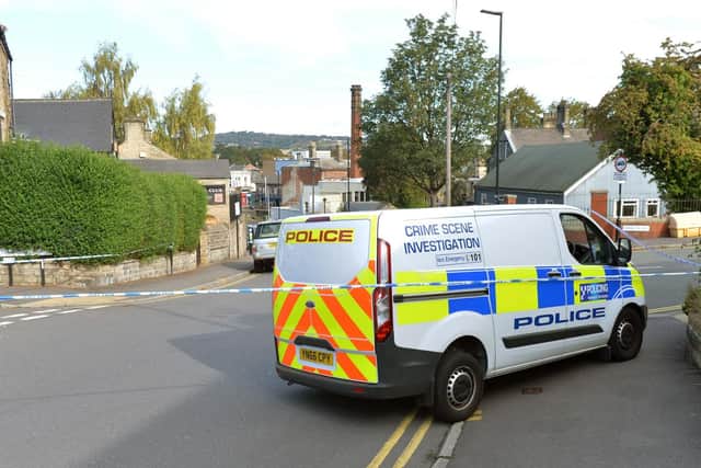 A Crime Scene Investigation van in Hillsborough, where two men were stabbed during the early hours of this morning