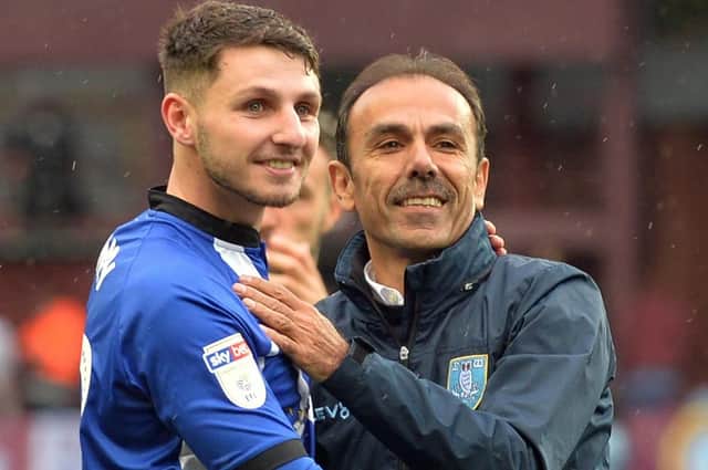 Matt Penney is congratulated by Jos Luhukay after the win at Aston Villa