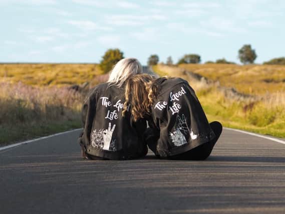 Vegan friendly hand painted jacket brand, The Good Life, by Sheffield-based social media marketer and entrepreneur and mum Aimee Hughes. Aimee is pictured left in one of her jackets with best friend Leanne Marshall. Photo by Leanne Marshall.