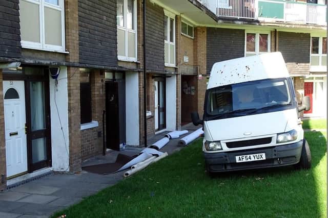Carpet fitters parking on the grass