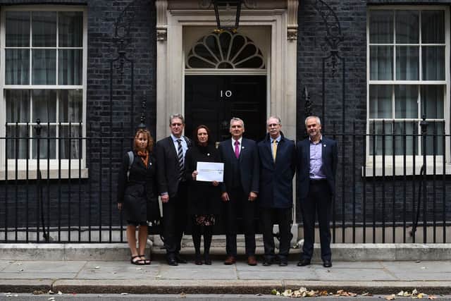 Headteachers stand outside Number 10 Downing Street, London, as they deliver a letter to the Chancellor to demand extra cash for schools. Picture: Kirsty O'Connor/PA Wire