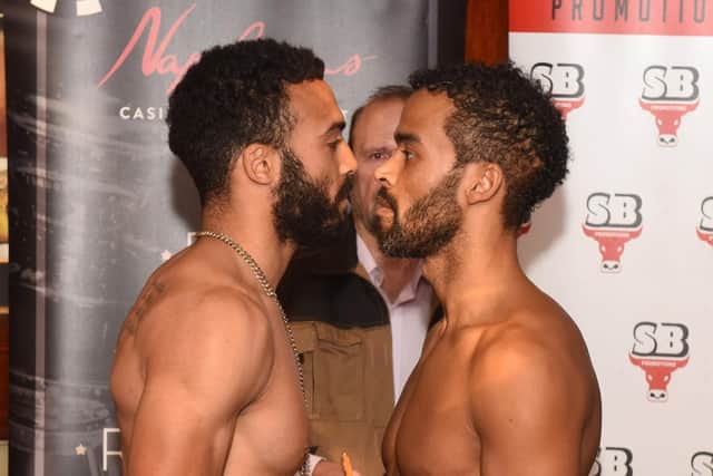 Anthony Tomlinson and Jayce Dixon face off at the weigh-in.