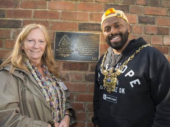 Lord Mayor Magid Magid with Penny Rea at the unveiling of the plaque at Zion Graveyard