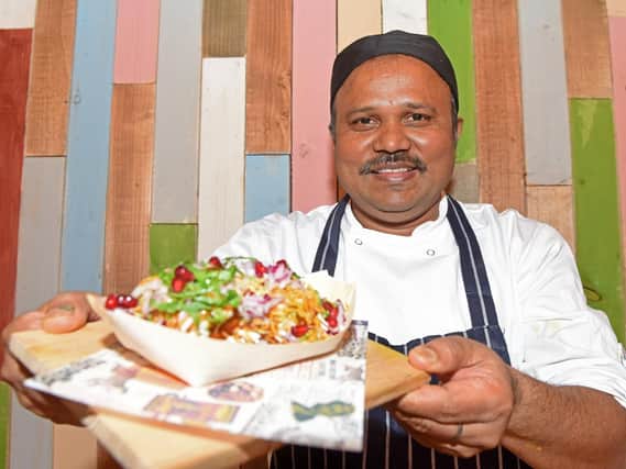 Head chef Kumar Aravind with an aloo cutlet at The Cat's Pyjamas, Ecclesall Road. Picture: Andrew Roe