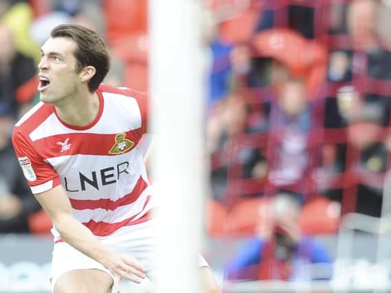 John Marquis scored twice in Doncaster Rovers' win at Plymouth Argyle