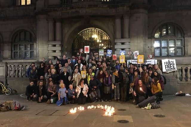 Friends of the jailed anti-fracking protestor Simon Roscoe Blevins gather in a show of solidarity outside Sheffield Town Hall