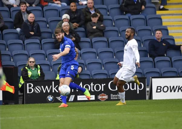 Chesterfield's Will Evans crosses the ball: Picture by Steve Flynn/AHPIX.com, Football: The Emirates FA Cup - Qualifing Fourth Round match AFC Fylde -V- Chesterfield at Mill Farm, Wesham, Lancashire, England on copyright picture Howard Roe 07973 739229
