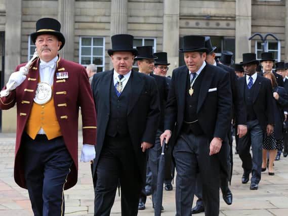 The new Master Cutler, Nicholas Cragg, second left, leads a procession to Sheffield Cathedral after being installed at the Cutlers' Hall.