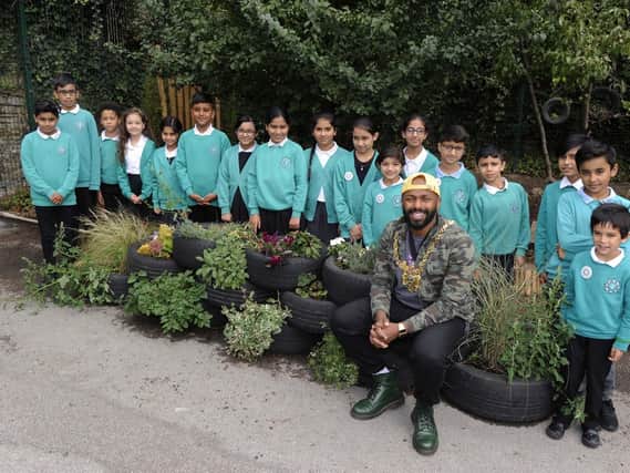 Pictured is the Lord Mayor of Sheffield Coun Magid Magid on his visit to Nether Edge Primary School