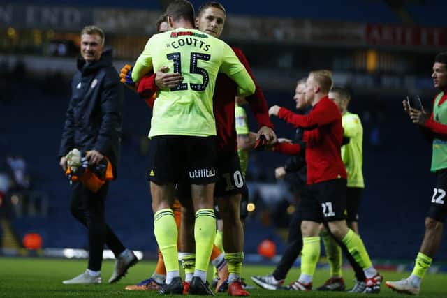 Billy Sharp embraces Paul Coutts