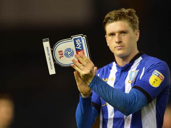 Adam Reach with his man of the match award from the draw against West Brom on Wednesday night