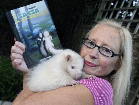 Author Tracey Barker has just had a children's book published based on one of her own two skunks that live at home with her and her husband, Steve. Pictures: Steve Ellis