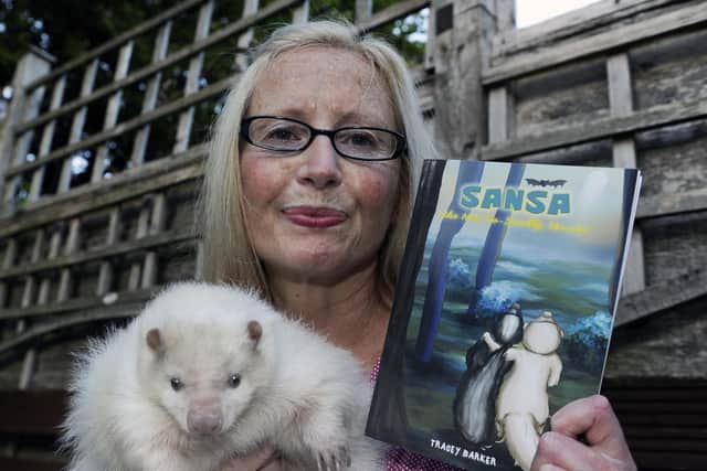 Author Tracey Barker has just had a children's book published based on one of her own two skunks that live at home with her and her husband, Steve. Pictures: Steve Ellis