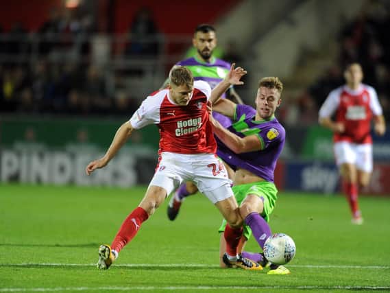 Rotherham United's Michael Smith grapples with Bristol City's Adam Webster