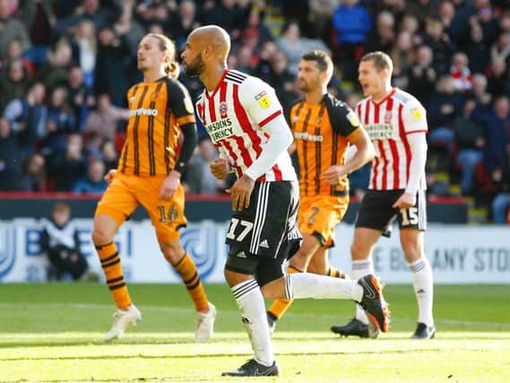 David McGoldrick wheels away to celebrate after scoring his winning penalty against Hull (Sportimage)
