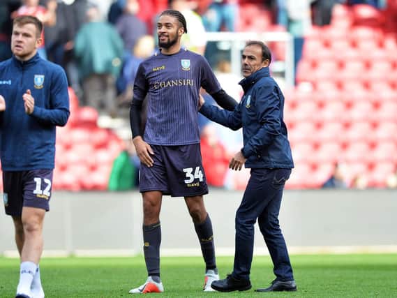 Sheffield Wednesday boss Jos Luhukay celebrates the win with Michael Hector