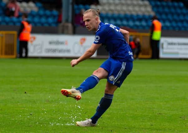 Actions from Halifax Town v Leyton Orient, at The Shay. Matty Kosylo