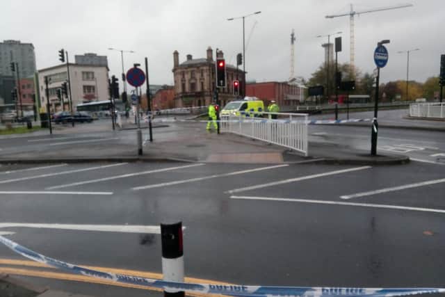 Police at the scene of the hit-and-run on St Mary's Gate, Sheffield