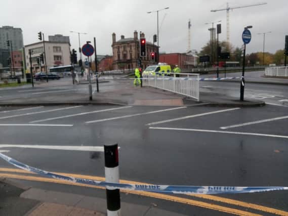 Police at the scene of the hit-and-run on St Mary's Gate, Sheffield