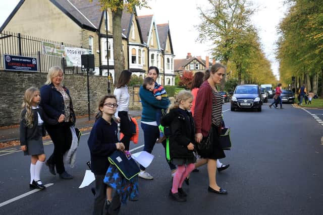 Parents and children crossing Psalter Lane
