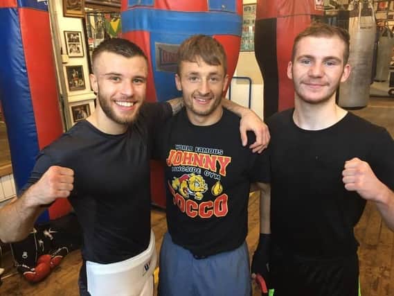 Tommy Frank, left, and SBC gym-mate colleagues, Keanen Wainwright and Kane Salvin.