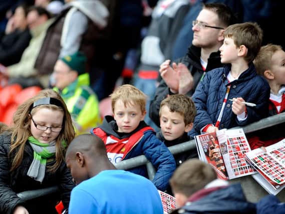 Young Rovers fans collect autographs