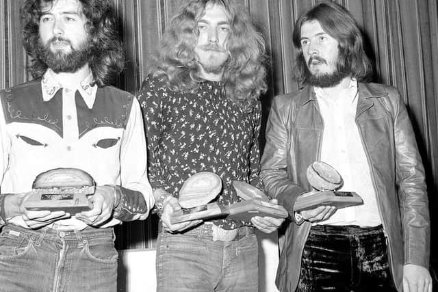 Jimmy Page, Robert Plant and John Bonham of Led Zeppelin pictured at an awards ceremony in 1970