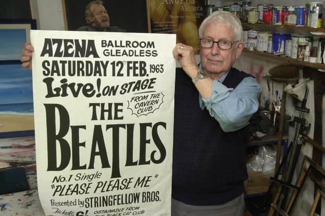 Artist Colin Duffield at his home studio in 2003 with the poster he did for Peter Stringfellow for a Beatles concert in 1963
