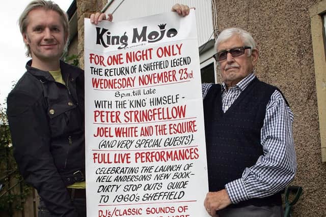 Colin Duffield, right, and Neil Anderson with a poster Colin designed in 2011 for a King Mojo reunion