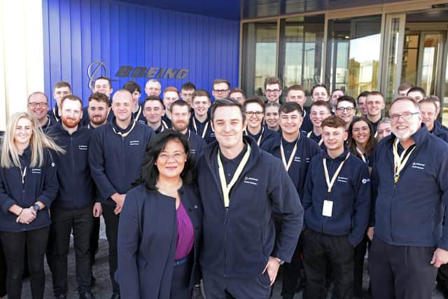 James Needham, Boing Sheffield, Senior Operations Leader and Jenette Ramos, Senior Vice President, Boeing Manufacturing, Supply Chain and Operations, with staff members and apprentices outside the new Sheffield manufacturing facility. Picture: Marie Caley NSTB-25-10-18-Boeing-8. Picture: Marie Caley