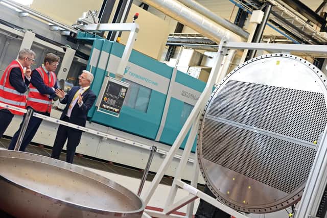 Business Secretary Greg Clark, centre, with Andrew Storer, Nuclear AMRC CEO and Craig Lester, BEIS Nuclear Specialist, on a visit to Nuclear AMRC. Picture: Marie Caley
