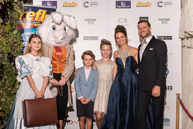 Alice in Wonderland themed ball in 2017 - Stood with Alice and the rabbit then L-R - James Mullen, Hannah Mullen, Sarah Mullen, Paul Mullen (Picture: Andrew Kelly photography)