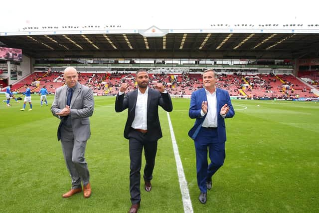Kell Brook (c) with his dad Terry (r} and Dominic Ingle (l) during the League One match at Bramall Lane