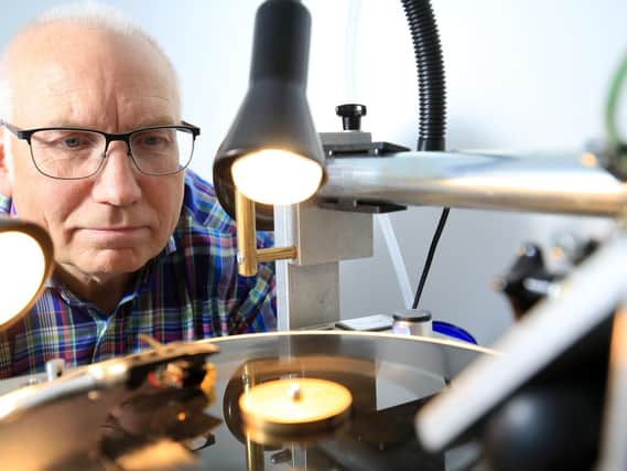 Jon Downing from Sheffield has set up his own record Label Do It Thissen. Jon is pictured in his studio with the lathe cutting equipment producing a record. Picture: Chris Etchells