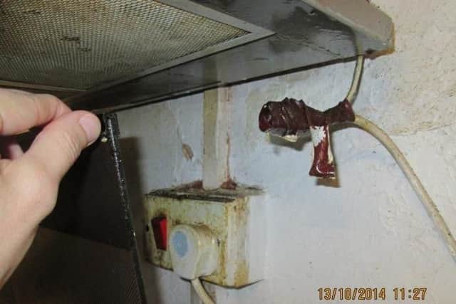 Sockets and plugs were left exposed at this property