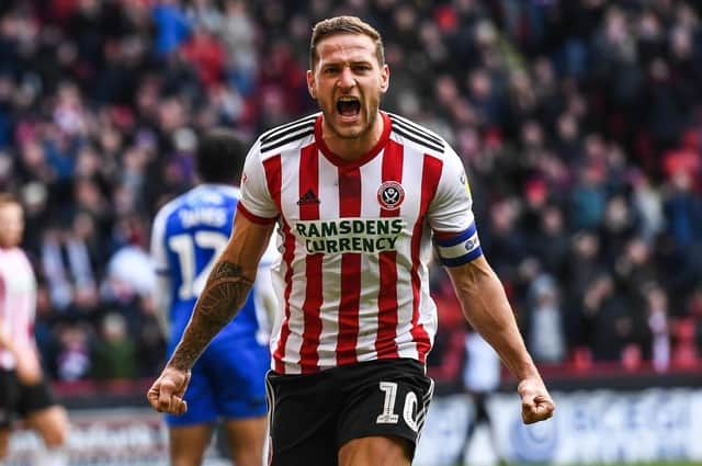 Billy Sharp celebrates one of his three goals against Wigan