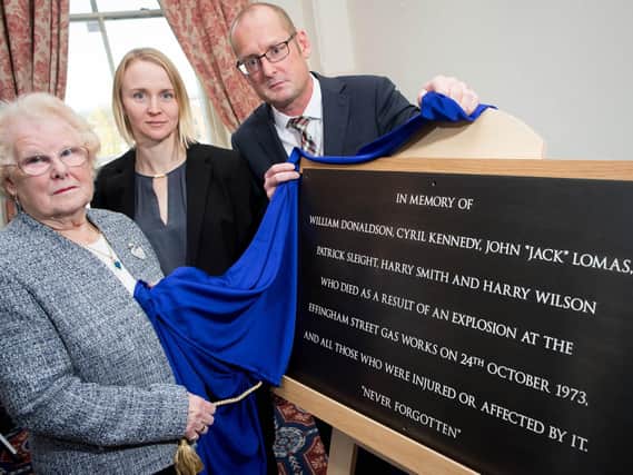 Unveiling of memorial to Effimgham Street Gas Works explosion in October 1973 that killed six men. From left, Jean Taylor from the Retired Employees Association, Hannah White, Land Regeneration Manager National Grid Property, Frank Evans, Head of Operations National Grid Property.