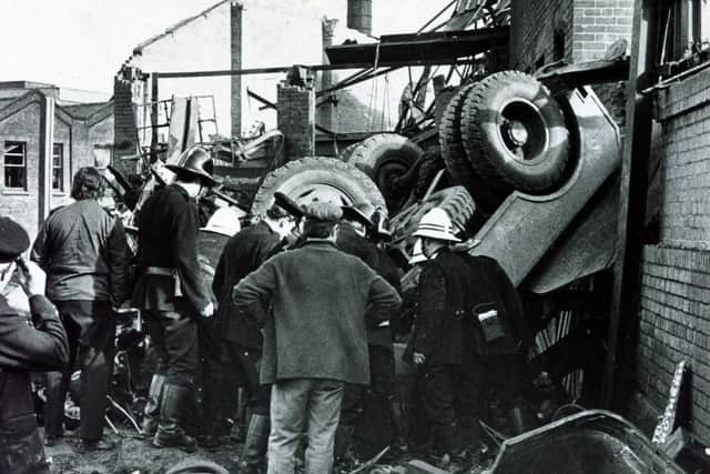 Rescuers on the scene of the deadly explosion at Effingham Street gas works in October 1973