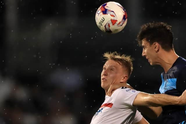 Cauley Woodrow (left) could make his first appearance in a Barnsley shirt this weekend