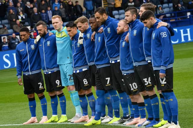 Owls players join in a minutes silence at Hillsborough last weekend